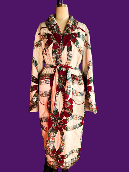 Patterned robe on a mannequin against a purple background