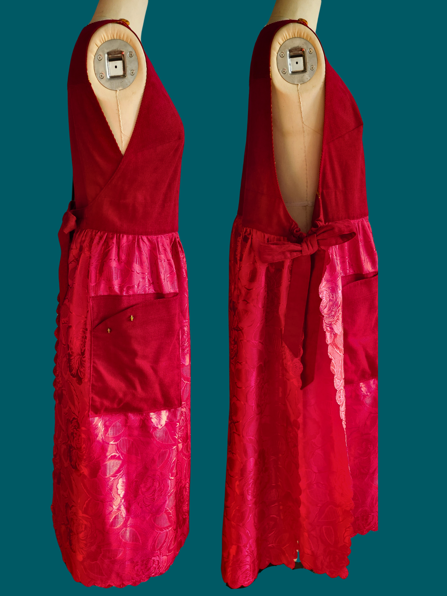 Red dress on a mannequin against a teal background