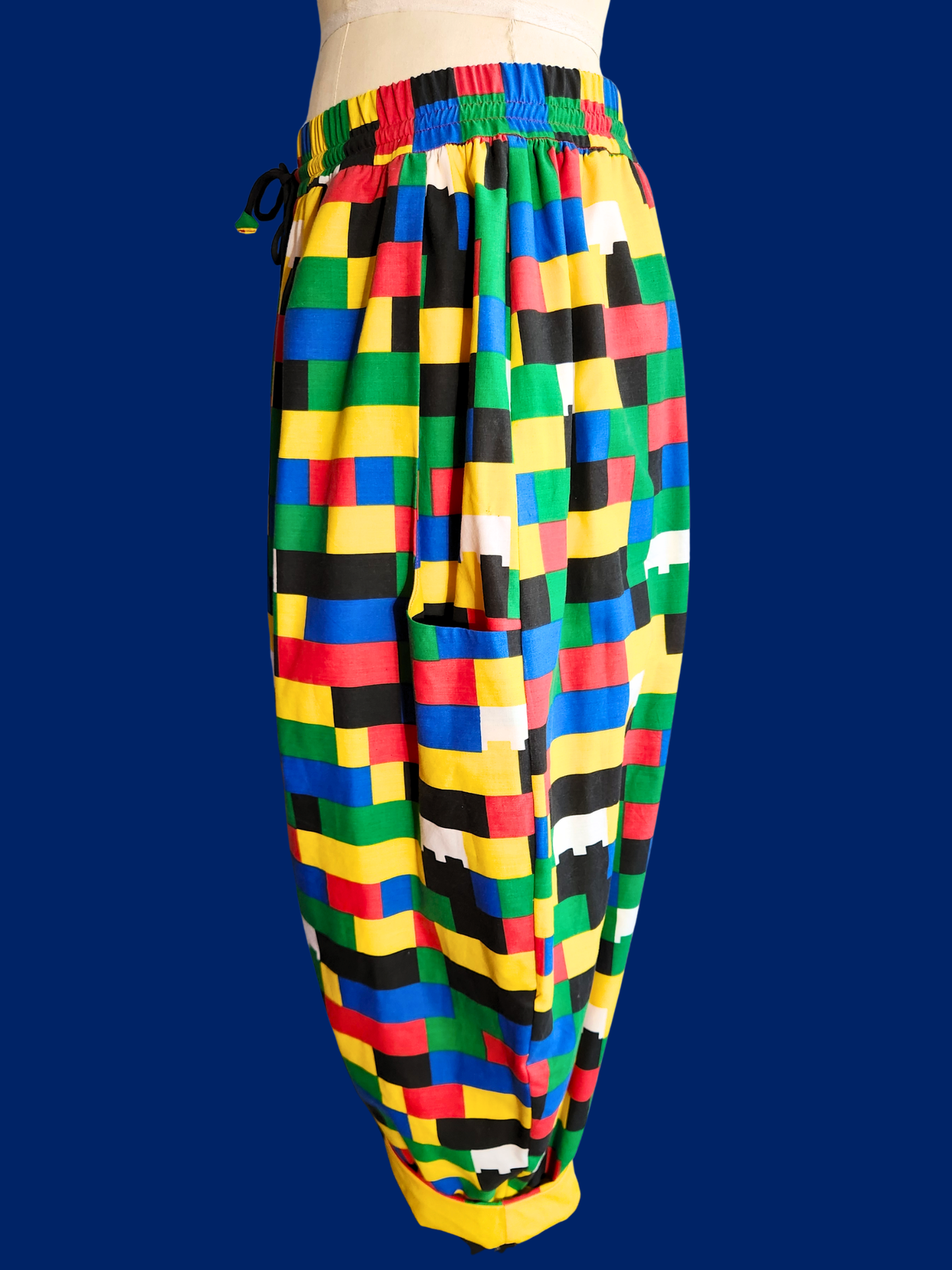 Colorful checkered pants on a blue background